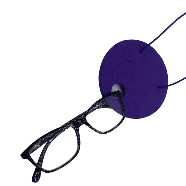 Large Purple Polymer Clay Statement necklace holding glasses on a white background