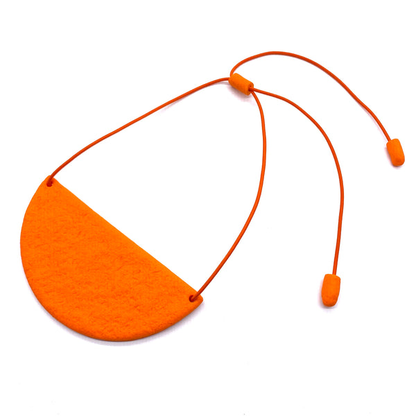 orange half circle polymer clay statement necklace with coordinating elastic cord